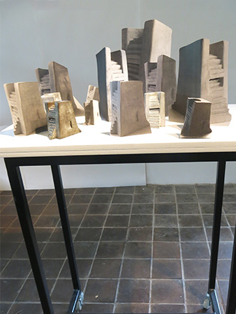 Steps, Bronze Objects 8.5 x 5.5 cm, Xerox Objects up to 25cm, Wooden Slab Top 42 x 20cm, Height of metal stand 85cm